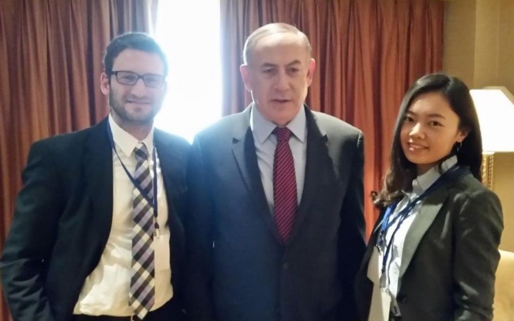 Prime Minister Benjamin Netanyahu in his Beijing hotel room, interviewed by The Times of Israel's diplomatic correspondent Raphael Ahren (left) and Times of Israel's Chinese editor Yifeng Zhou (Times of Israel staff)