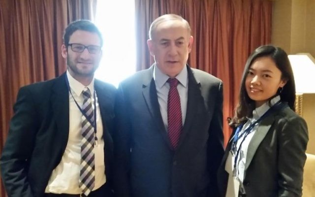 Prime Minister Benjamin Netanyahu in his Beijing hotel room, interviewed by The Times of Israel's diplomatic correspondent Raphael Ahren (left) and Times of Israel's Chinese editor Yifeng Zhou (Times of Israel staff)