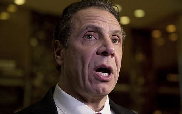 In this Wednesday, Jan. 18, 2017photo, New York Gov. Andrew Cuomo speaks to members of the media after meeting with President-elect Donald Trump at Trump Tower in New York. (AP Photo/Andrew Harnik) In this Wednesday, Jan. 18, 2017photo, New York Gov. Andrew Cuomo speaks to members of the media after meeting with President-elect Donald Trump at Trump Tower in New York. (AP Photo/Andrew Harnik)