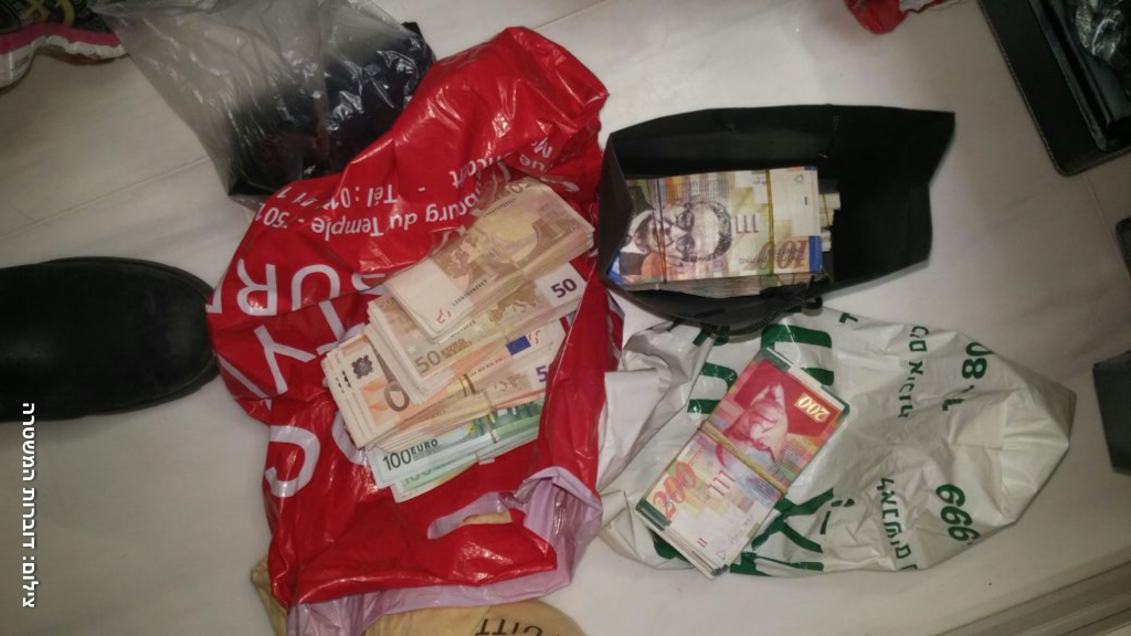 Some of the assets seized in a March 1, 2017 raid by Israeli police in conjunction with the FBI (Photo courtesy of Israel Police) Some of the assets seized in a March 1, 2017 raid by Israeli police in conjunction with the FBI (Photo courtesy of Israel Police)