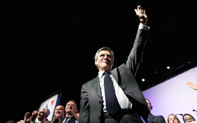 Francois Fillon, France's presidential candidate, waves to the audience during an election campaign meeting in Caen, France, on Thursday, March 16, 2017. (Christophe Morin/Bloomberg via JTA)