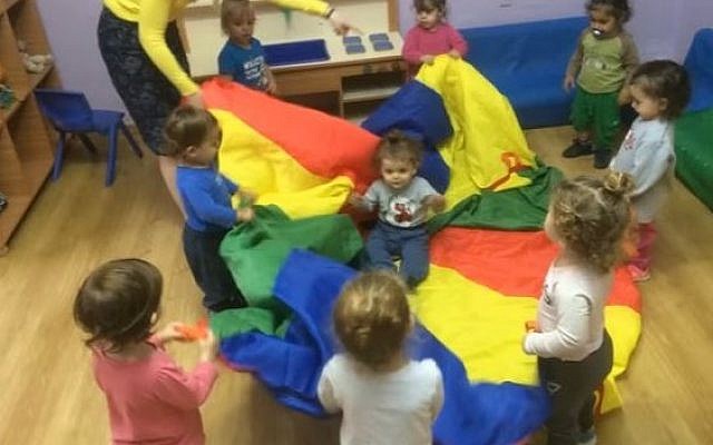 Illustrative of children playing at a kindergarten in Petah Tikvah. (Screen capture/ YouTube)