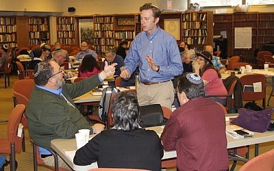Rabbi Ethan Tucker, a co-founder of Hadar, speaking with rabbis during a seminar at the New York yeshiva, March 1, 2017. (JTA/Ben Sales)