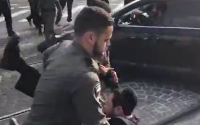 Police arrest an ultra-Orthodox Jewish protester during continuing riots in Jerusalem against the detention of a Torah student for failing to turn up for army conscription. March 20, 2017 (YouTube screenshot) Police arrest an ultra-Orthodox Jewish protester during continuing riots in Jerusalem against the detention of a Torah student for failing to turn up for army conscription. March 20, 2017 (YouTube screenshot)