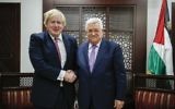 British Foreign Secretary Boris Johnson shakes hands with Palestinian President Mahmoud Abbas during their meeting in the West Bank city of Ramallah on March 8, 2017. (AFP Photo/Abbas Momani)