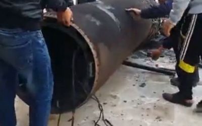 Jordanians inspect the remains of a Syrian missile and an Israeli Arrow interceptor that fell in Jordan on March 17, 2017 (Jordanian government/Petra) Jordanians inspect the remains of a Syrian missile and an Israeli Arrow interceptor that fell in Jordan on March 17, 2017 (Jordanian government/Petra)