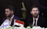 In this Tuesday, Feb. 21, 2017, file photo, FC Barcelona's Lionel Messi, (R), attends a gala dinner held at the Mena House in Giza, Egypt. (AP Photo/Nariman El-Mofty, File)
