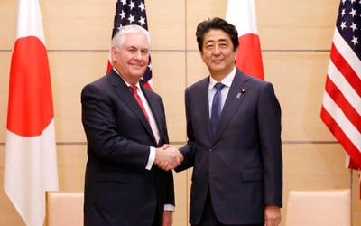 U.S. Secretary of State Rex Tillerson, left, and Japanese Prime Minister Shinzo Abe, right, shake hands during their meeting at the prime minister's office in Tokyo, Thursday, March 16, 2017. (AP Photo/Eugene Hoshiko, Pool)