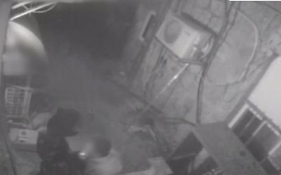 Security camera footage showing the suspect with a lit cigarette in his mouth, March 2017. (YouTube screenshot)