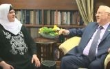 Taibe Hebrew teacher Jehan Jaber (L) meets with President Reuben Rivlin in his Jerusalem residence on March 8, 2017. (Screen capture/Facebook)