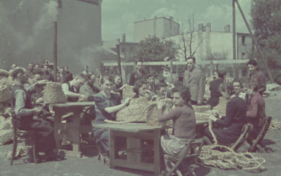 Jewish inmates of the Lodz ghetto in Nazi-occupied Poland at labor making baskets (United States Holocaust Memorial Museum)