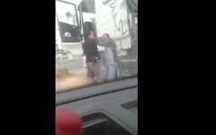 A still from a video showing a police officer assaulting an East Jerusalem truck driver (YouTube screenshot)
