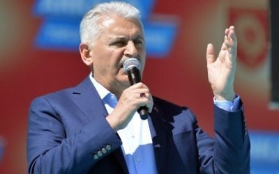 Turkish Prime Minister Binali Yildirim delivers a speech during an opening ceremony of multiple projects at the Ataturk Cultural Center (AKM) in Ankara on April 2, 2017. (AFP Photo/Adem Altan)