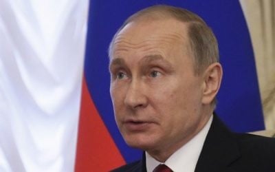 Russian President Vladimir Putin attends a meeting in Saint Petersburg on April 3, 2017. (AFP Photo/Pool/Dmitri Lovetsky)