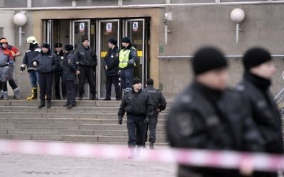 Illustrative: Police officers guard the entrance to Sennaya Square metro station in St. Petersburg, on April 3, 2017. (AFP Photo/Olga Maltseva)