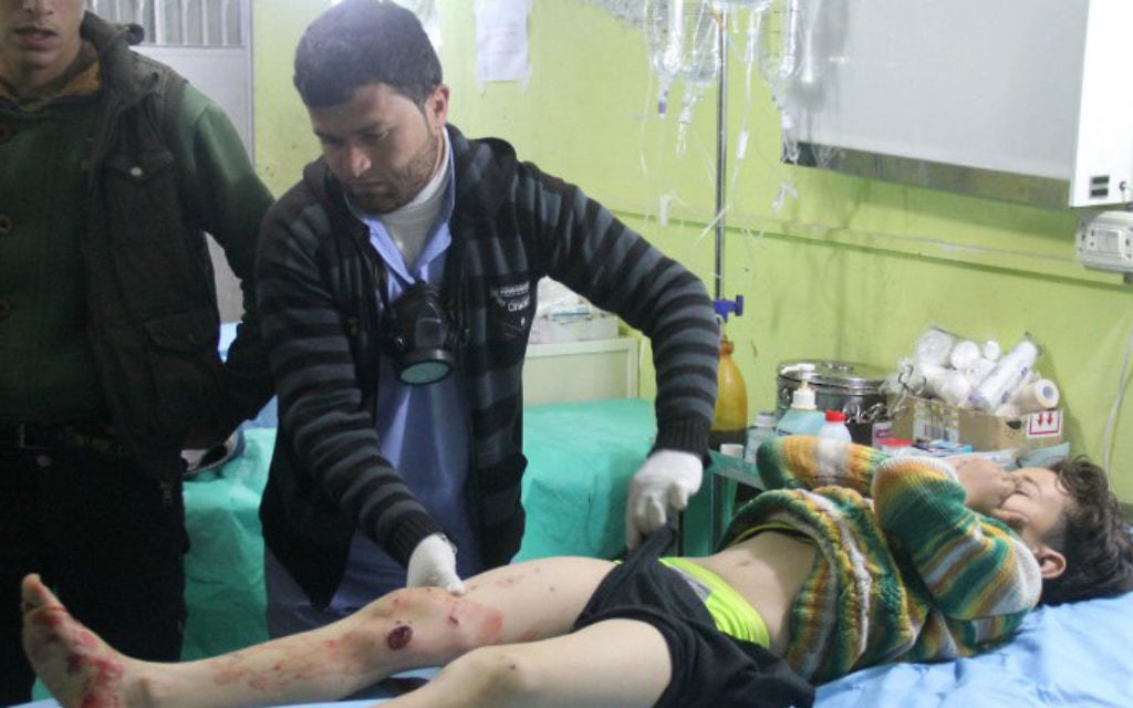 A Syrian child receives treatment at a hospital in Khan Sheikhun, a rebel-held town in the northwestern Syrian Idlib province, following an attack on April 4, 2017. (AFP PHOTO / Omar haj kadour)