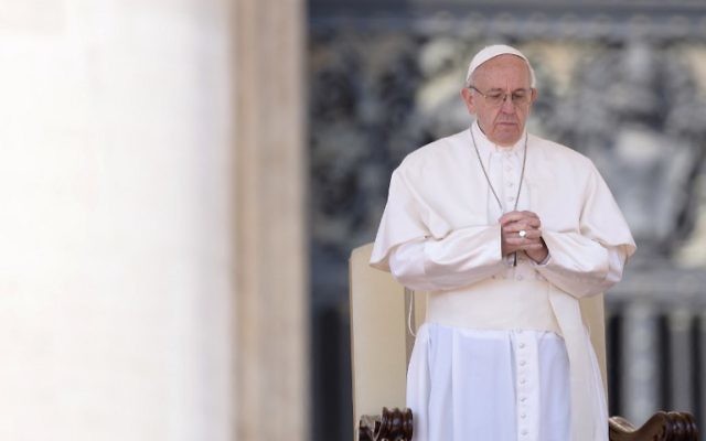 Pope Francis prays during a weekly general audience at St Peter's square, the Vatican, April 5, 2017. (AFP/Filippo MONTEFORTE) Pope Francis prays during a weekly general audience at St Peter's square, the Vatican, April 5, 2017. (AFP/Filippo MONTEFORTE)