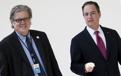 Strategist Steve Bannon (L) and White House Chief of Staff Reince Priebus walking through the colonnade of the White House, April 3, 2017. (AFP Photo/Brendan Smialowski)