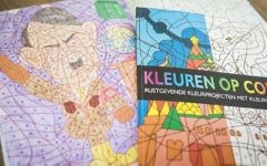A photo shows a coloring book with an image of Adolf Hitler bought at the Dutch store Kruidvat by Ray Vervloed in Pijnacker, the Netherlands, on April 5, 2017. (Alexander Schippers/AFP)