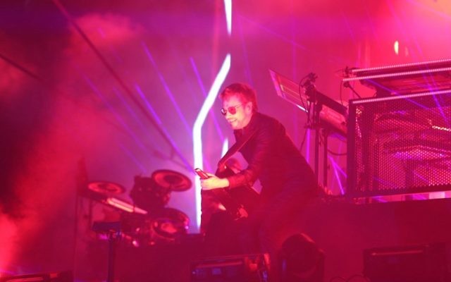 Electronic music pioneer Jean-Michel Jarre performs during concert to publicise the plight of the shrinking Dead Sea, the lowest place on earth at the foot of the ancient clifftop fortress of Massada in Israel, late April 6, 2017. (AFP PHOTO / MENAHEM KAHANA)