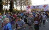 Local and foreign participants attend the first international Tehran marathon at Azadi Square in the Iranian capital on April 7, 2017. (AFP PHOTO / ATTA KENARE)