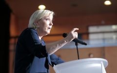 French presidential election candidate for the far-right Front National party Marine Le Pen delivers a speech during a campaign meeting at the Palais des Congres in Ajaccio on the French Mediterranean island of Corsica, on April 8, 2017. (AFP Photo/Pascal Pochard-Casabianca)