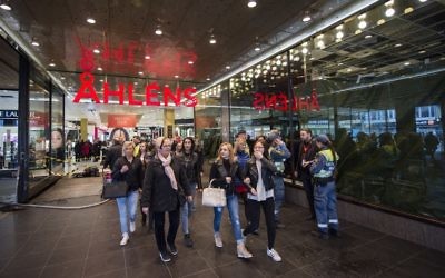 People are pictured at the Ahlens department store where a truck drove into in Stockholm, Sweden, on April 10, 2017. (AFP PHOTO / Jonathan NACKSTRAND)