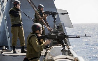 Israeli soldiers onboard the Israeli vessel Saar 5 Class Corvette "INS Hanit" take part in the "Novel Dina 17" training session in the Mediterranean Sea on April 4, 2017 ( AFP PHOTO / JACK GUEZ)