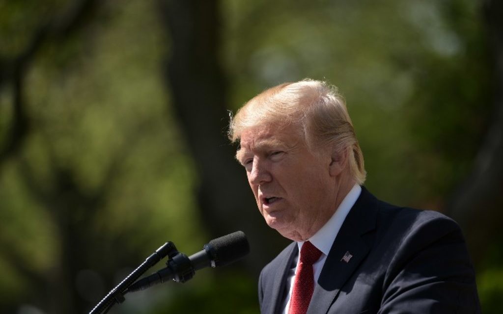 US President Donald Trump speaks during the swear-in ceremony for Neil Gorsuch as an associate justice of the US Supreme Court in the Rose Garden of the White House on April 10, 2017 in Washington, DC. (AFP Photo/Mandel Ngan)