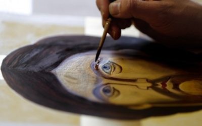 Foreign students of the Bethlehem Icon Center work on their painting during their course, in the biblical West Bank city of Bethlehem on April 11, 2017. (AFP PHOTO / THOMAS COEX)