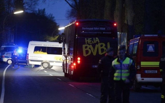 The bus of Borussia Dortmund was damaged by explosion some 10km away from the stadium prior to the UEFA Champions League 1st leg quarter-final football match BVB Borussia Dortmund v Monaco in Dortmund, western Germany on April 11, 2017. (AFP PHOTO / Sascha Schuermann)