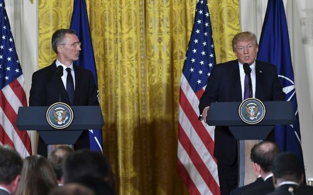 US President Donald Trump, right, and NATO Secretary General Jens Stoltenberg hold a joint press conference in the East Room at the White House in Washington, DC, April 12, 2017. (AFP/Nicholas Kamm) US President Donald Trump, right, and NATO Secretary General Jens Stoltenberg hold a joint press conference in the East Room at the White House in Washington, DC, April 12, 2017. (AFP/Nicholas Kamm)