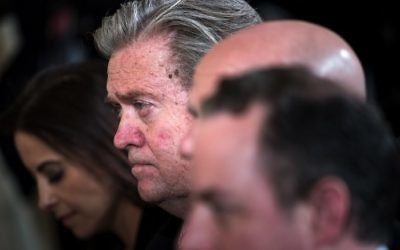 Strategist Steve Bannon listens during a joint press conference with NATO Secretary General Jens Stoltenberg and US President Donald Trump in the East Room of the White House April 12, 2017 in Washington, DC. AFP/Brendan Smialowski)