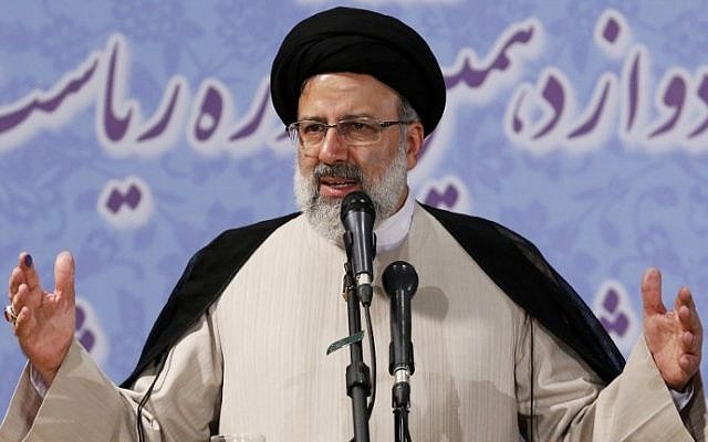 Iranian cleric Ebrahim Raisi delivers a speech after registering his candidacy for the upcoming presidential elections in the capital Tehran on April 14, 2017. (AFP Photo/Atta Kenare)