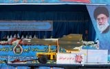 An Iranian military truck with a picture of President Hassan Rouhan carries a rocket and displays a banner reading "Death to Israel" during a parade marking the country's National Army Day, in Tehran, April 18, 2017. (AFP/Atta Kenare)
