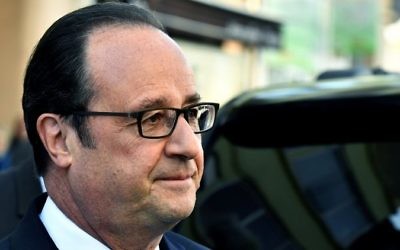 Outgoing French president Francois Hollande looks on as he leaves after casting his vote at a polling station in Tulle, central France, April 23, 2017. (AFP/ GEORGES GOBET) Outgoing French president Francois Hollande looks on as he leaves after casting his vote at a polling station in Tulle, central France, April 23, 2017. (AFP/ GEORGES GOBET)