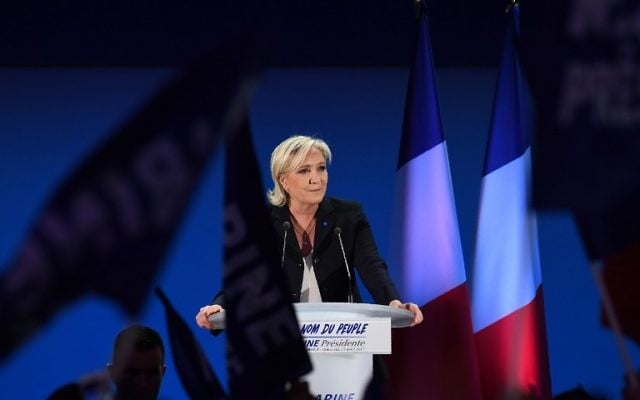 French presidential election candidate for the far-right Front National (FN) party Marine Le Pen delivers a speech in Henin-Beaumont, on April 23, 2017, after the first round of the Presidential election. (AFP PHOTO / ALAIN JOCARD)