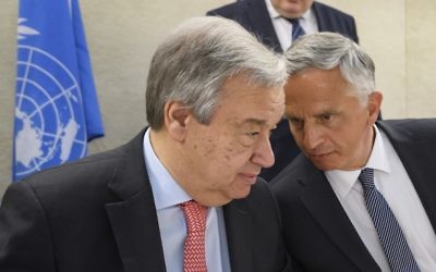 UN Secretary-General Antonio Guterres, listens to Swiss Foreign Minister Didier Burkhalter at the opening of a high-level conference at the United Nations Office in Geneva, April 25, 2017. (AFP/Fabrice COFFRINI)