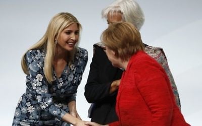 (L-R) First Daughter and Adviser to the US President Ivanka Trump greets Managing Director of the International Monetary Fund (IMF) Christine Lagarde and German Chancellor Angela Merkel during a panel discussion at the W20 women's empowerment summit sponsored by the Group of 20 major economic powers on April 25, 2017 in Berlin. (Odd Andersen/AFP) 