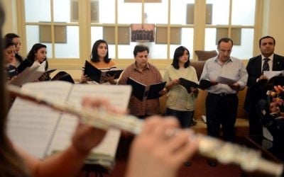 Saint Joseph's Roman Catholic church choir rehearses in a hall beside the church in the Egyptian capital Cairo on April 19, 2017, ahead of Pope Francis' visit. (AFP Photo/Mohamed El-Shahed)