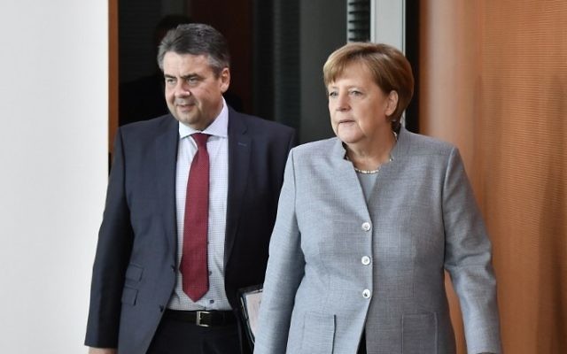 German Chancellor Angela Merkel (R) and German Vice Chancellor and Foreign Minister Sigmar Gabriel arrive for the weekly Cabinet Meeting in Berlin, on April 26, 2017. (AFP/John MacDougall) German Chancellor Angela Merkel (R) and German Vice Chancellor and Foreign Minister Sigmar Gabriel arrive for the weekly Cabinet Meeting in Berlin, on April 26, 2017. (AFP/John MacDougall)