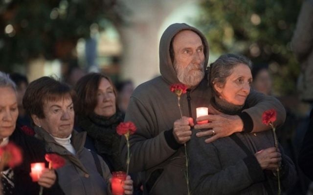 People hold candles during a ceremonial march to commemorate the 80th aniversary of the bombing the Spanish northern Basque village of Gernika on April 26, 2017. (Ander Gillenea/AFP) People hold candles during a ceremonial march to commemorate the 80th aniversary of the bombing the Spanish northern Basque village of Gernika on April 26, 2017. (Ander Gillenea/AFP)
