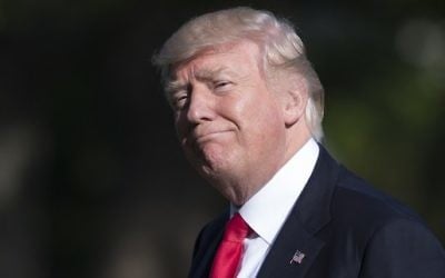 US President Donald Trump walks after arriving on Marine One on the South Lawn of the White House in Washington, DC, April 28, 2017, following a trip to Atlanta, Georgia. (AFP/Saul Loeb) US President Donald Trump walks after arriving on Marine One on the South Lawn of the White House in Washington, DC, April 28, 2017, following a trip to Atlanta, Georgia. (AFP/Saul Loeb)