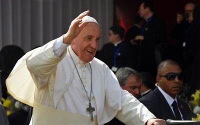 Pope Francis arrives at the Coptic Catholic College of Theology and Humanities in the southern Cairo suburb of Maadi, on April 29, 2017. (AFP/Mohamed El-Shahed)