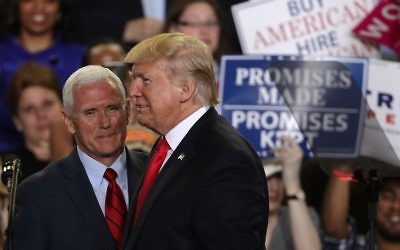 US President Donald Trump (R) is introduced by Vice President Mike Pence (L) during a "Make America Great Again Rally" at the Pennsylvania Farm Show Complex Expo Cent,er April 29, 2017, in Harrisburg, Pennsylvania. (Alex Wong/Getty Images/AFP) US President Donald Trump (R) is introduced by Vice President Mike Pence (L) during a "Make America Great Again Rally" at the Pennsylvania Farm Show Complex Expo Cent,er April 29, 2017, in Harrisburg, Pennsylvania. (Alex Wong/Getty Images/AFP)
