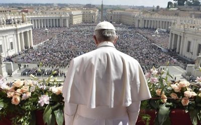 Pope Francis addresses the crowd prior to delivering his Urbi et Orbi (to the city and to the world) message from the main balcony of St. Peter's Basilica, at the Vatican, Sunday, April 16, 2017. (L'Osservatore Romano/Pool Photo via AP)