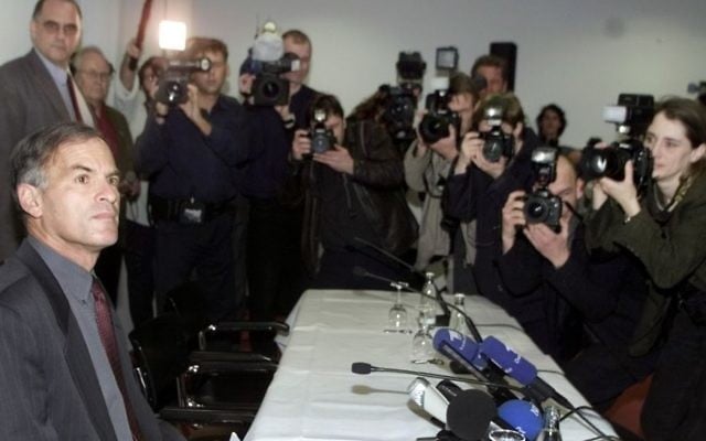 Norman Finkelstein, seated left, promotes the German translation of his book "The Holocaust Industry" during a news conference in Berlin on Wednesday, Feb. 7, 2001. Finkelstein claims that Holocaust memory has developed into an industry which in turn encourages anti-Semites and Holocaust deniers. (AP Photo/Herbert Knosowski) Norman Finkelstein, seated left, promotes the German translation of his book "The Holocaust Industry" during a news conference in Berlin on Wednesday, Feb. 7, 2001. Finkelstein claims that Holocaust memory has developed into an industry which in turn encourages anti-Semites and Holocaust deniers. (AP Photo/Herbert Knosowski)