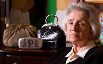 Judith Leiber sits with some of her designs. (Courtesy)