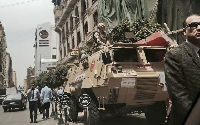 Soldiers guard a street near a church in downtown Cairo, Egypt on April 10, 2017. (AP/Nariman El-Mofty) Soldiers guard a street near a church in downtown Cairo, Egypt on April 10, 2017. (AP/Nariman El-Mofty)