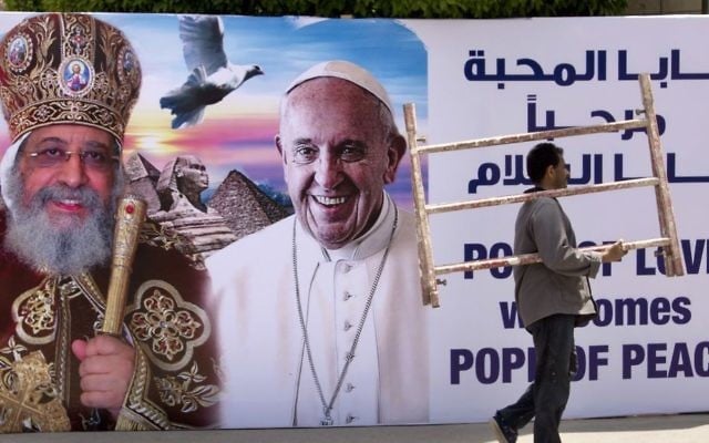 A billboard with a picture of Egyptian Coptic Pope Tawadros II, left, welcomes Pope Francis, at St. Mark's Cathedral in Cairo, Egypt, Thursday, April 27, 2017. (Amr Nabil/AP) A billboard with a picture of Egyptian Coptic Pope Tawadros II, left, welcomes Pope Francis, at St. Mark's Cathedral in Cairo, Egypt, Thursday, April 27, 2017. (Amr Nabil/AP)